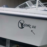 Boat with 'Hawk 22' decal on a white background